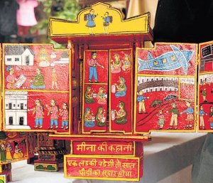 A red coloured kavad based on modern theme Meena ki Kahaani