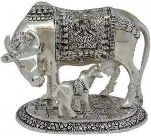 A cow and calf metal statue